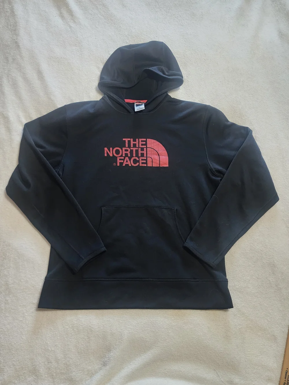The North Face Black Hoodie with Red Logo